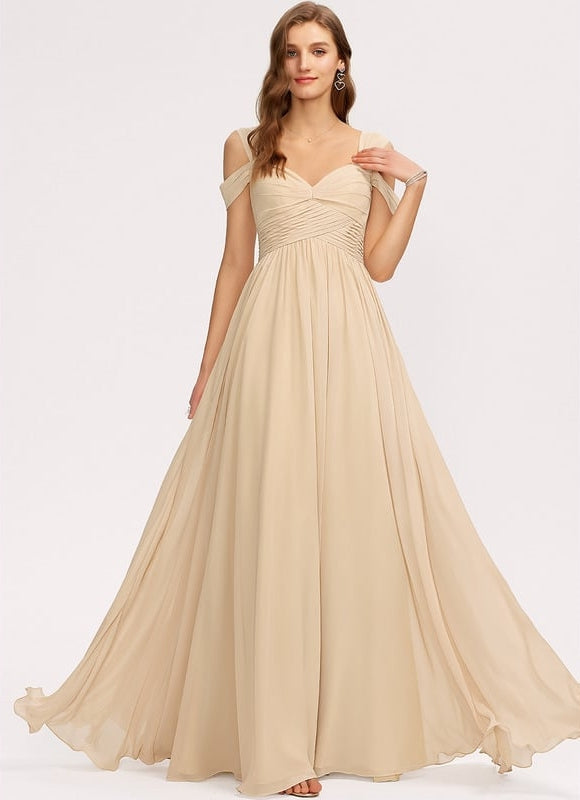 Robe Dorée Mousseline Élégante À Décolleté Plongeant.