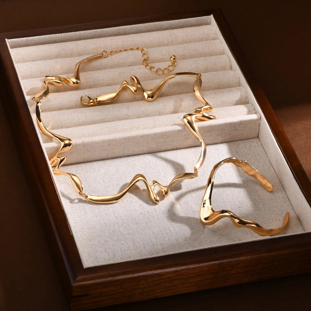 Fluid Wave Gold Necklace & Bracelet Set for Delicate Refinement